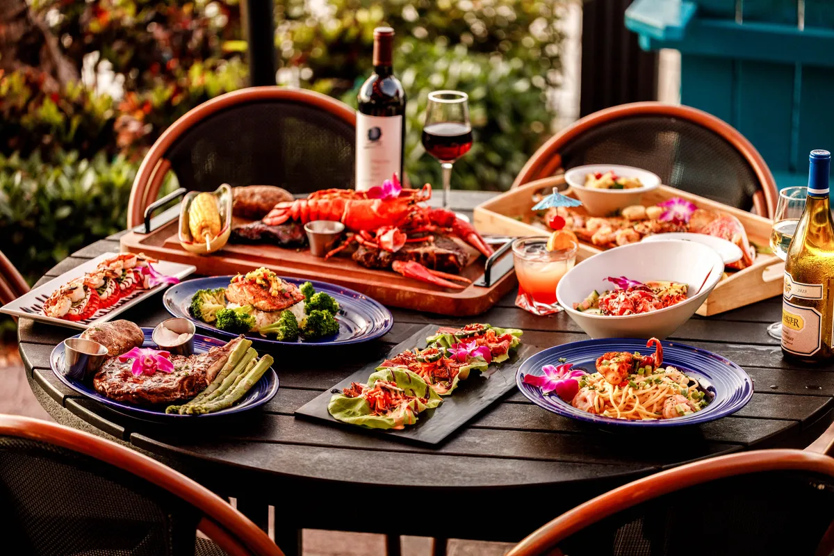 A Sundowners table with lobster, seafood, steak and pasta